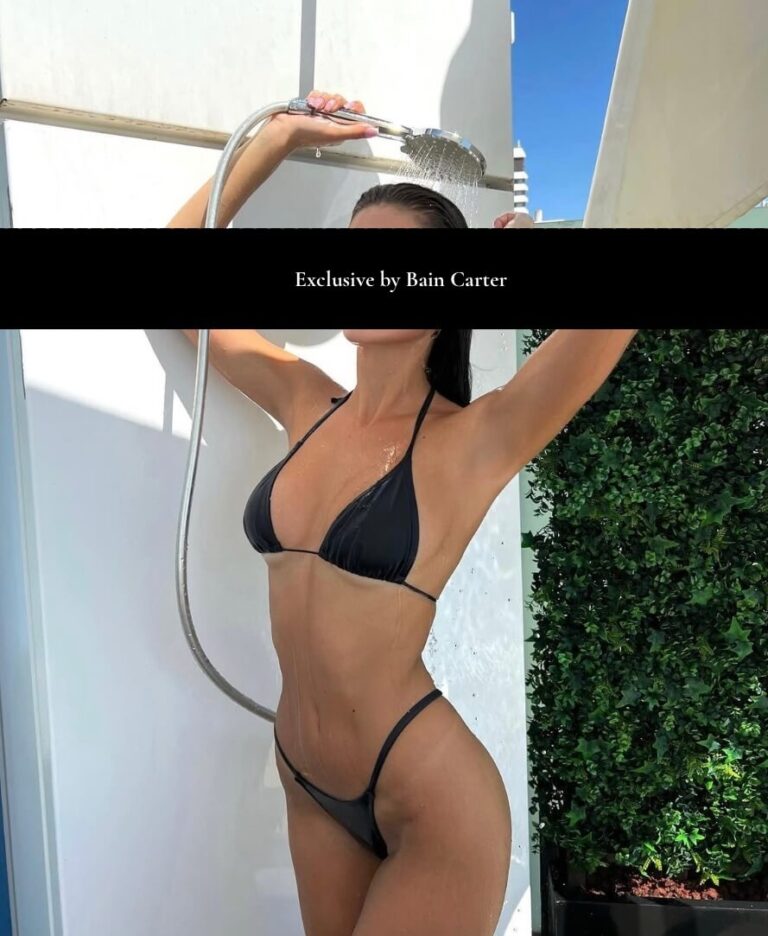 Elegant luxury escort wearing black bikini with refined vip companion summer style