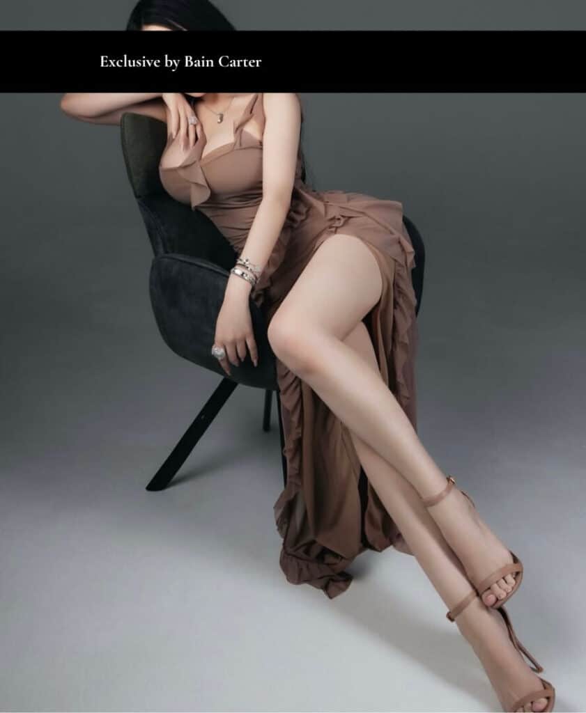 Elegant vip companion wearing brown evening dress with refined luxury escort style