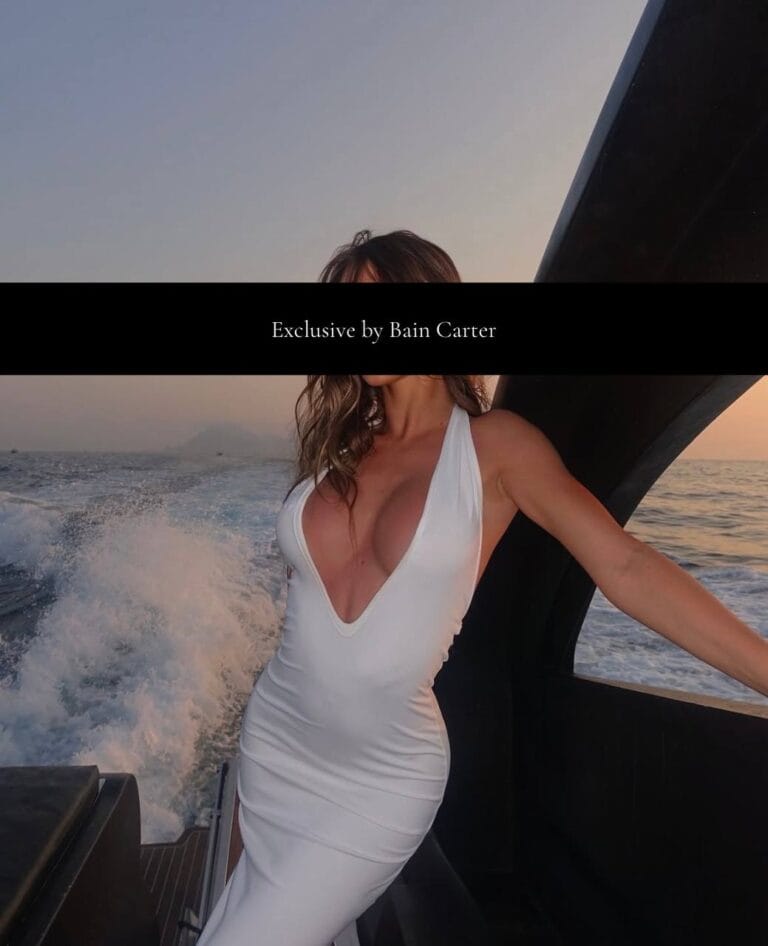 Calista aboard a yacht during a summer evening in Athens.