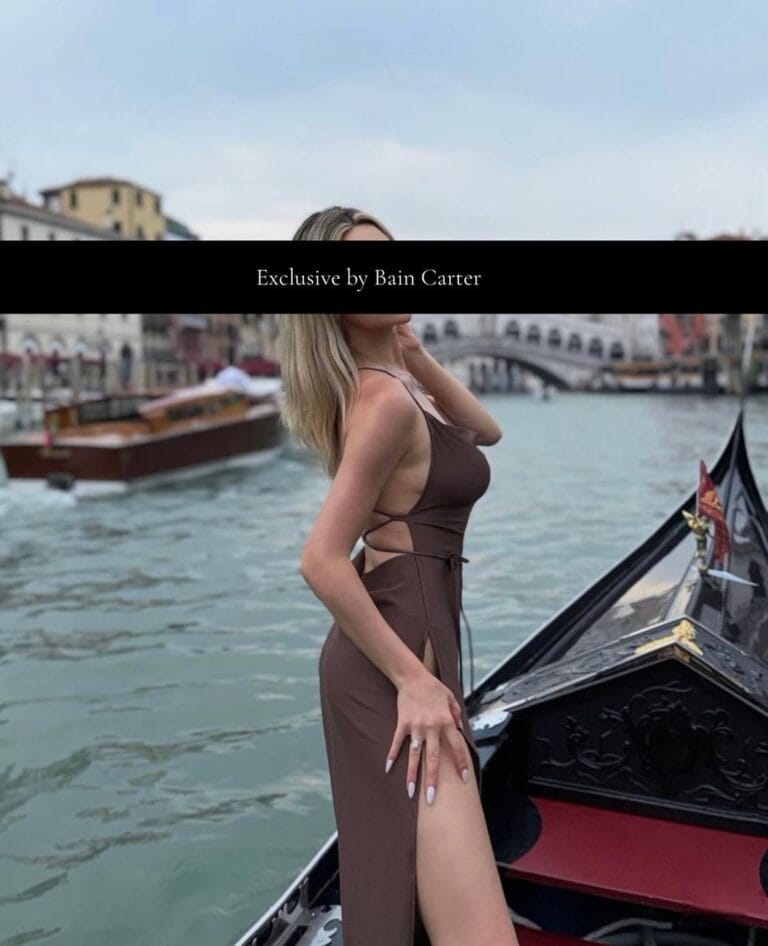 Lilia aboard a traditional Venetian boat during a private experience in Venice.
