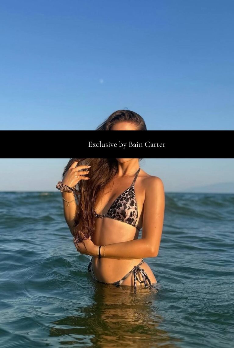 Carmen wearing a bikini at the beach in Valencia