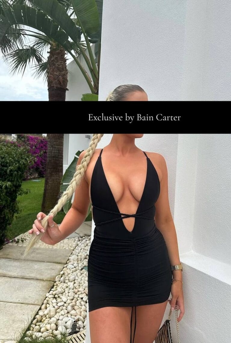 Freja wearing a black evening dress in Marbella.