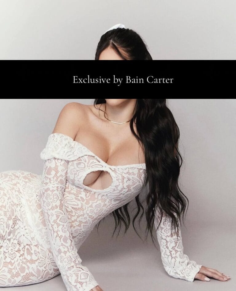 Gabriela posing in a white dress in Milan