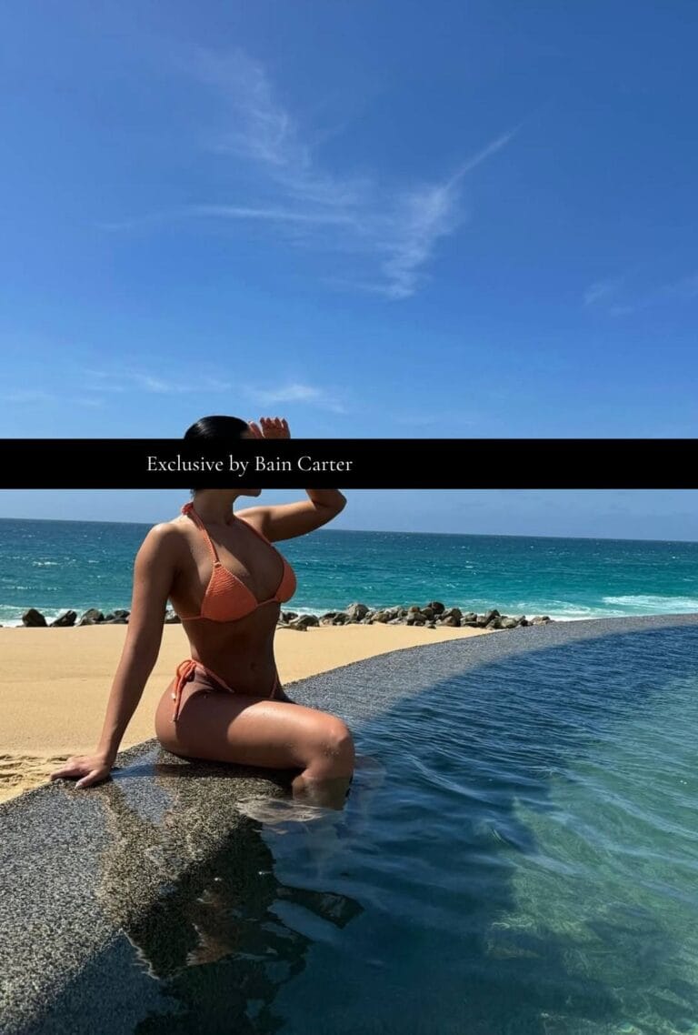 Regina enjoying a beachside setting in Tulum