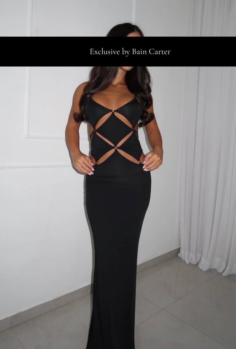 Rania wearing a black dress in Dubai