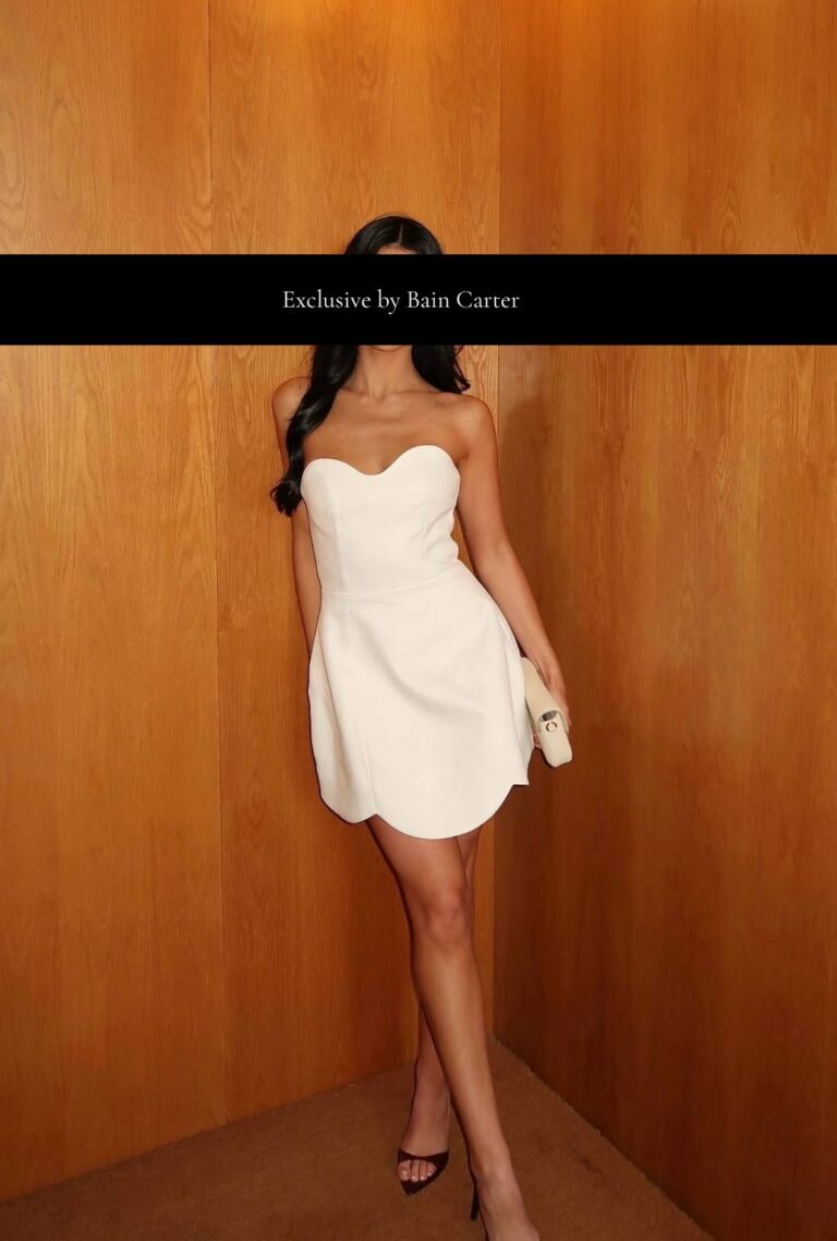 Escort in Rome wearing a white evening dress